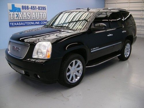 We finance!!!  2009 gmc yukon denali awd leather roof nav 3rd row tv texas auto