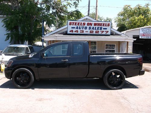 2005 nissan titan. 24inch rims,lambo doors,tv