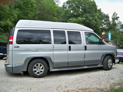 Light grey 4 door conversion van