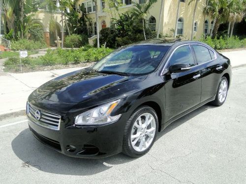 2013 nissan maxima with only 1,800 miles ! leather, sunroof ,spoiler,foglights