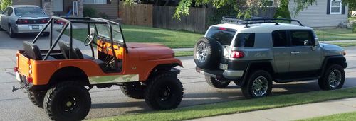 1972 cj5,  5" lift,  bronco orange, new upholstery,  36" "military tires"