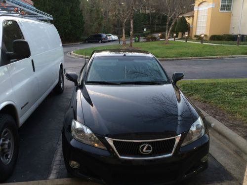 Lexus is 250 c convertible, loaded, 6 speed manual   love it but moving overseas