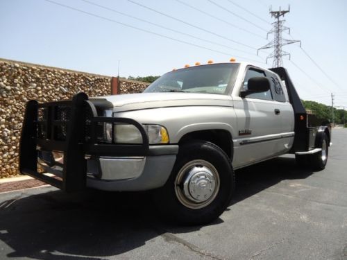 5.9l cummins-skirted gooseneck flatbed-laramie-pwr lthr-cd-drw-all pwr-ext cab