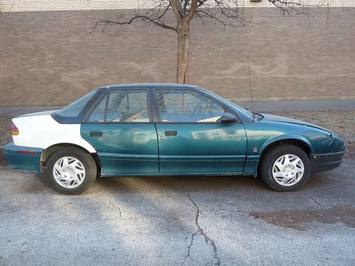 1993 saturn s-series sl1 base sedan 4-door 1.9l - geen /  aquamarine