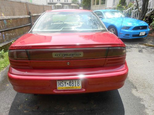 Dodge intrepid.  large four-door, full-size, front-wheel drive sedan. 3.3l v6