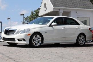 Arctic white auto premium i pkg sport pkg navigation only 21k miles msrp $56,655