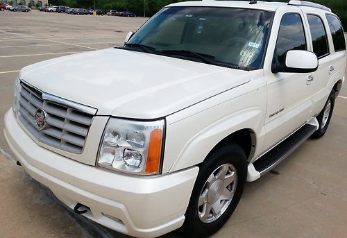 2003 awesome cadillac suv. drives like a charm. great price. don't miss out