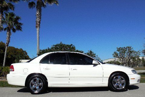 Gorgeous sport sedan~leather~bose~heated seats~new tires~ivory white~cd~superb!!