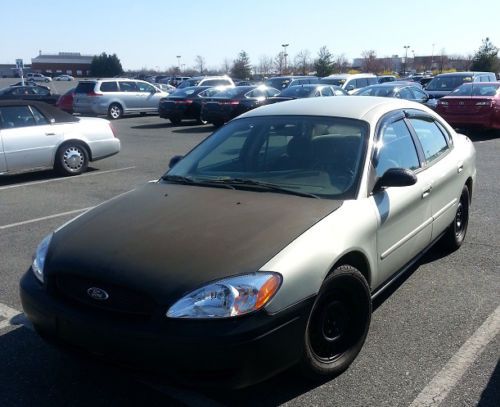 2005 ford taurus (runs and drives / says &#034;check transmission&#034;)