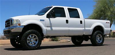 No reserve 2001 ford f250 7.3l diesel lifted crew 4x4 xlt low mile very clean!!!