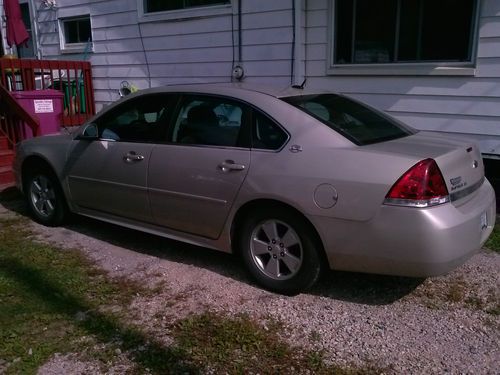 2009 4 door impala ls gold color