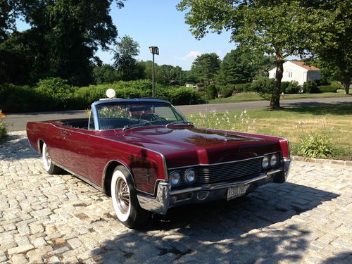 1966 maroon lincoln continental convertible suicide doors