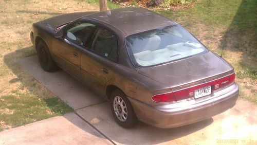 2003 buick century, ~140,000 miles, good v6 engine, good a/c, bronze mist color