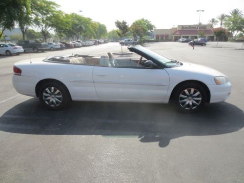 2002 chrysler sebring convertible 2 4l great on gas.