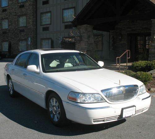 2003 lincoln town car cartier sedan 4-door 4.6l low reserve