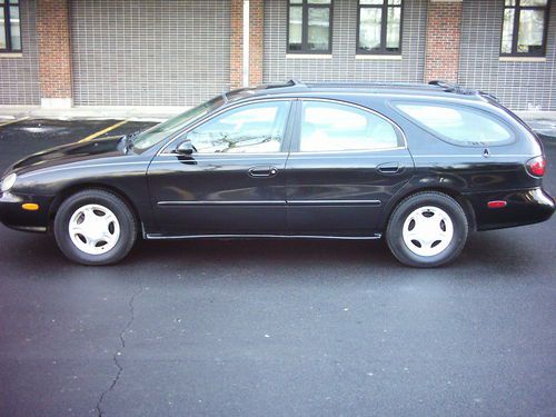 Only 57,756 original low miles on beautiful taurus wagon!! immaculate car!!