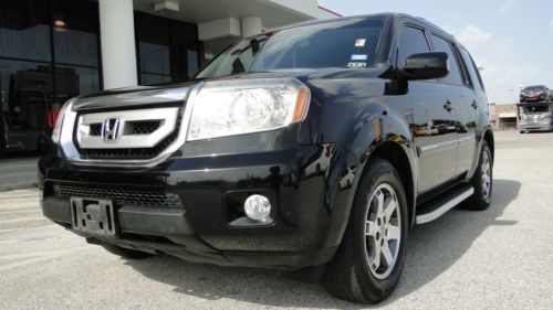 2009 honda pilot touring fully loaded w/ navi, leather seats, premium sound, etc