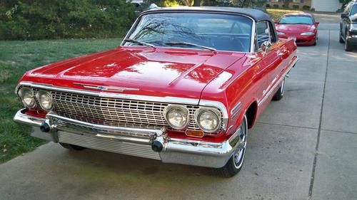 Red, black interior, black convertible top