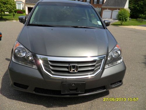 2008 honda odyssey exl 9400 miles, reverse end camera, like new, roof