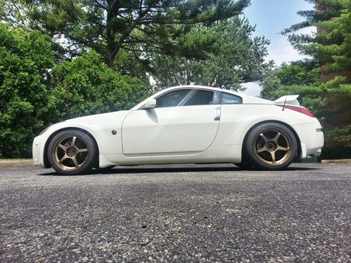 Stunning 2004 nissan 350z 350 z 6-speed, low miles, wheels, springs, fiber wing.