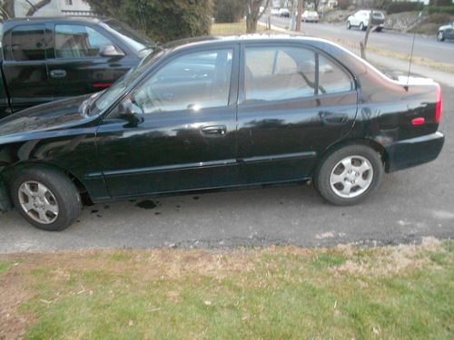 2000 hyundai  4 dr. black automatic high miles reliable