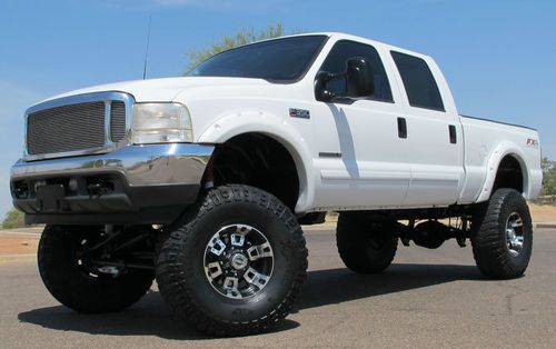 **no reserve** 2001 ford f350 7.3l diesel crew 4x4 lifted lariat pkg az clean