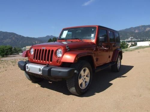 09 jeep wrangler unlimited 4wd 4dr sahara auto orange navigation