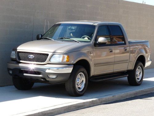 Gorgeous 2001 ford f-150 lariat supercrew 4wd 5.4l. leather. sunroof