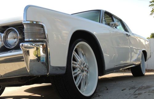 1965 lincoln continental w/ suicide doors