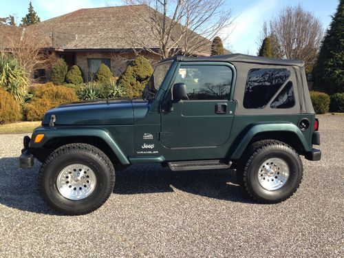 Lifted 03 jeep wrangler sahara edition procomp lift 33"tires-ion alloys new top