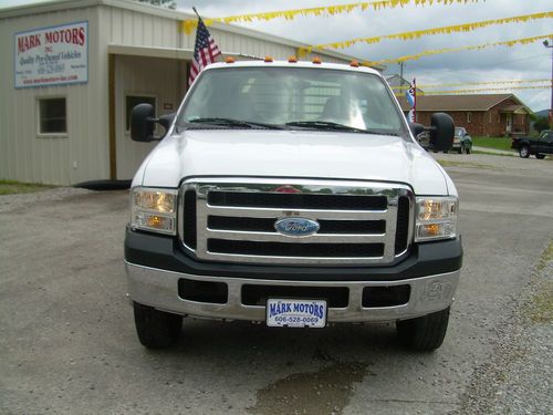 2007 ford f-350 super duty power stroke 4x4 flat bed ready to go!!!!