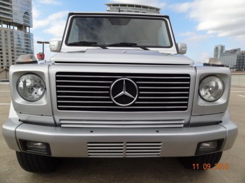 05 mercedes g 500 silver on black low miles runs great looks great no reserve