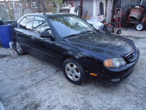 Black kia spectra 2003