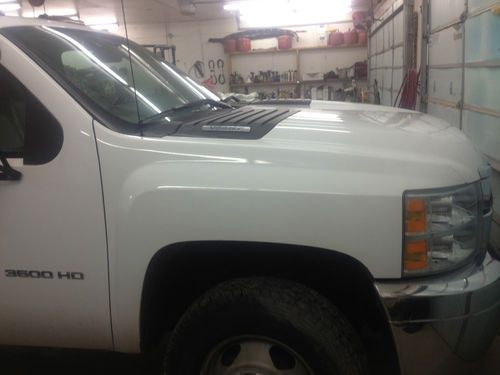 2011 3500  12' flat bed 1 ton dually; single cab 4wd