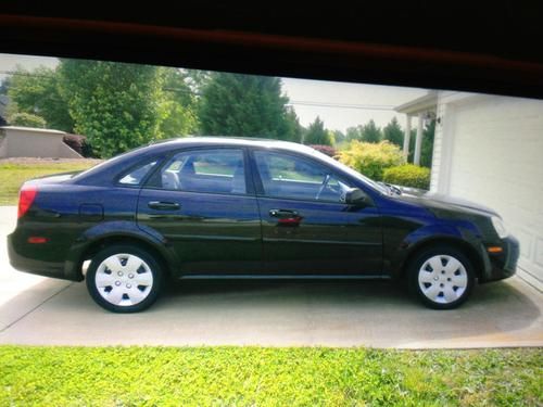 2006 suzuki forenza gas saver only 55k actual miles no reserve!!!!!!