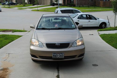 Gold 2007 toyota corolla. good condition. gas saver!