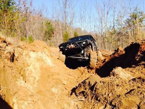 Lifted 92 xj jeep cherokee exocage rollcage link suspension on 37s 8k winch