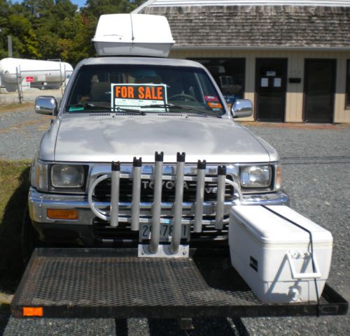 1990 toyota 4runner sr5v6.  outfitted for surf fishing.  gun metal gray.