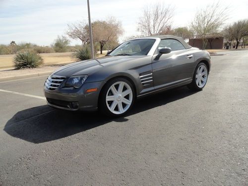 Beautiful charocal grey crossfire with red leather interior. no reserve