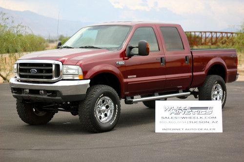 2004 ford f250 diesel lariat 4x4 crew cab 4wd leather lifted 61k miles see video