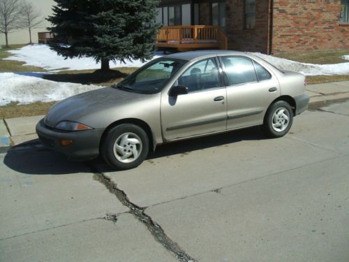 1997 cavalier 5 spd. 2.2 litre air power locks