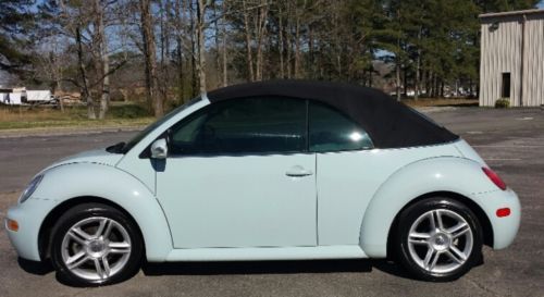 Volkswagon new beetle convertible. 2004. turbo. excellent condition. garage kept