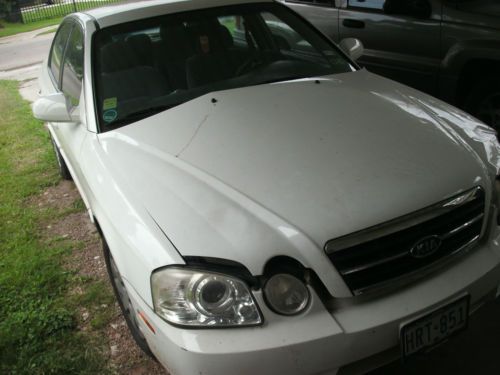 2005 kia optima lx sedan 4-door 2.4l ~ white ~ needs front end work ~ runs good