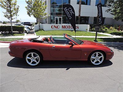 2004 jaguar xkr convertible orange with black and orange interior