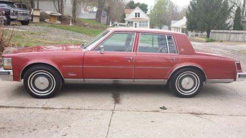 Beautiful 1976 red cadillac seville 4 door sedan