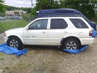 1998 white isuzu rodeo ls sport utility 4-door 3.2l