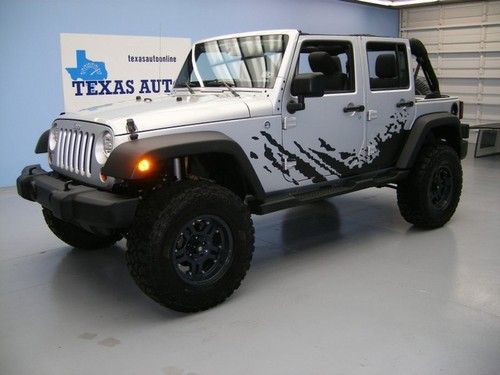 We finance!!!  2012 jeep wrangler unlimited sport 4x4 hard top auto lift 17 rims