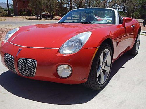 2007 red solstice convertible with 58k miles rebuilt salvage title drives nice