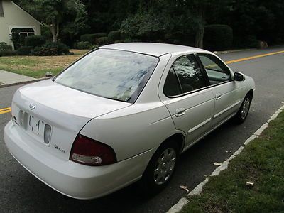 2 owner dealer trade very strong running  4 cylinder sentra priced right