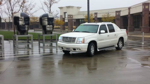 Diamond white classy yet rugged cadillac style &amp; power be ready for anything!!!!